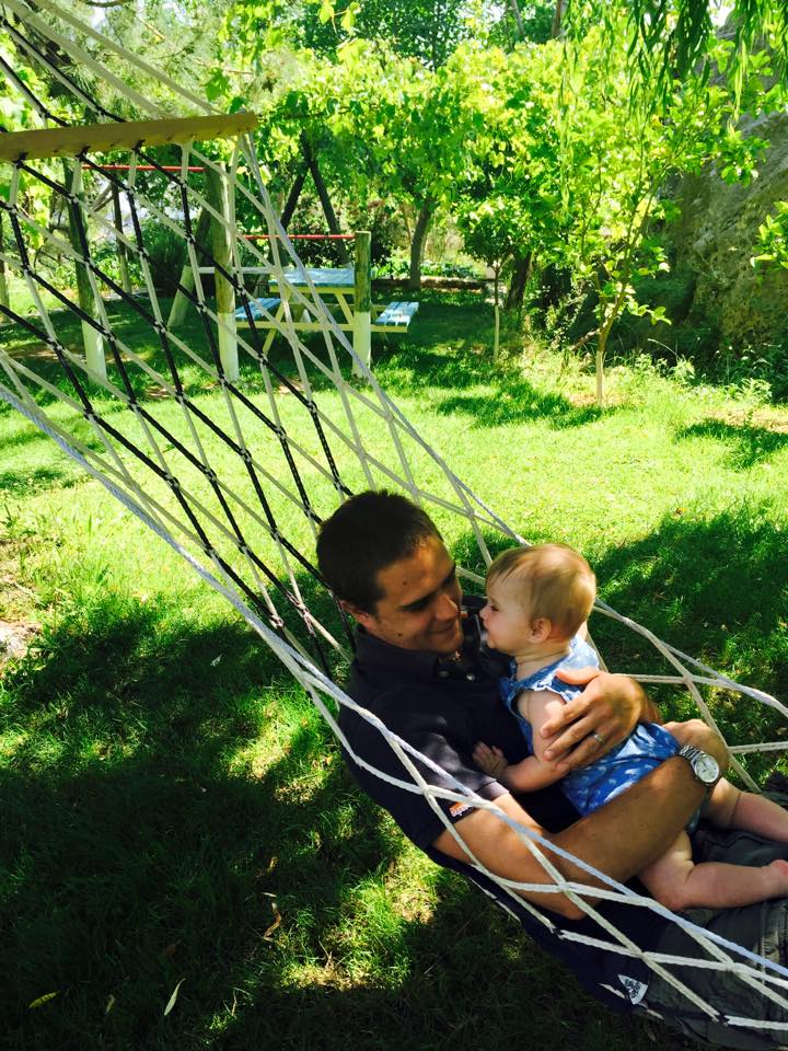 dad and daughter in a hammock