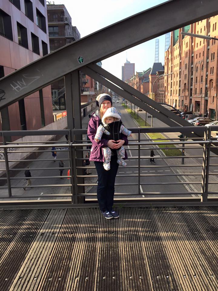 mum and daughter in baby carrier