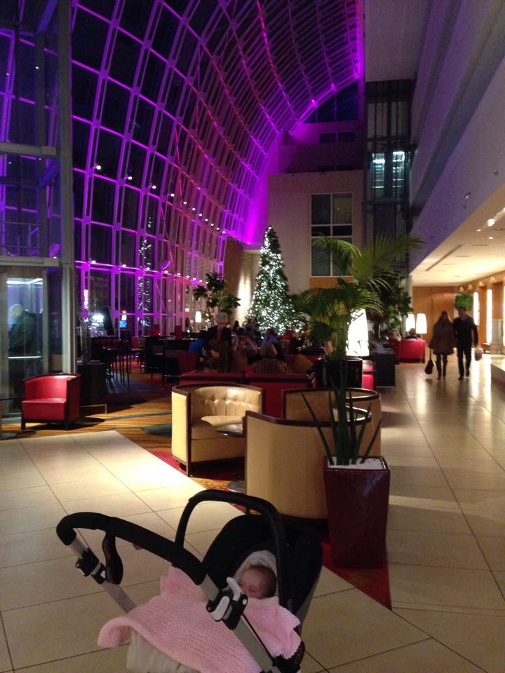 baby in hotel lobby. Belgium Christmas Markets with a Baby