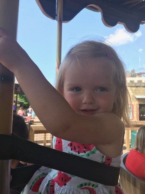 Our daughter enjoying the carousel at Chessington World of Adventures