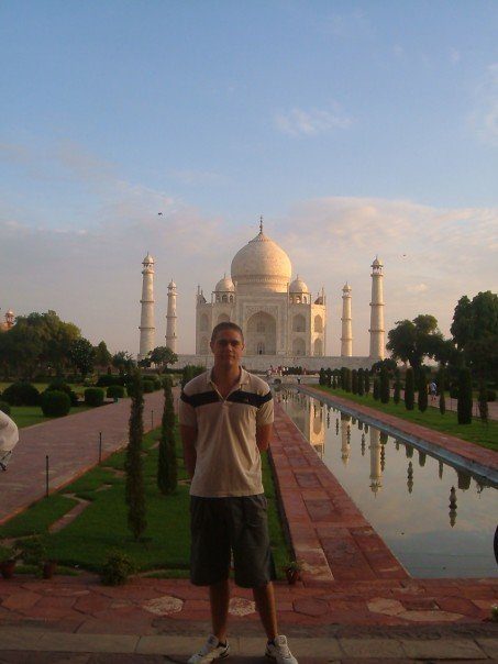 man in front of taj mahal 