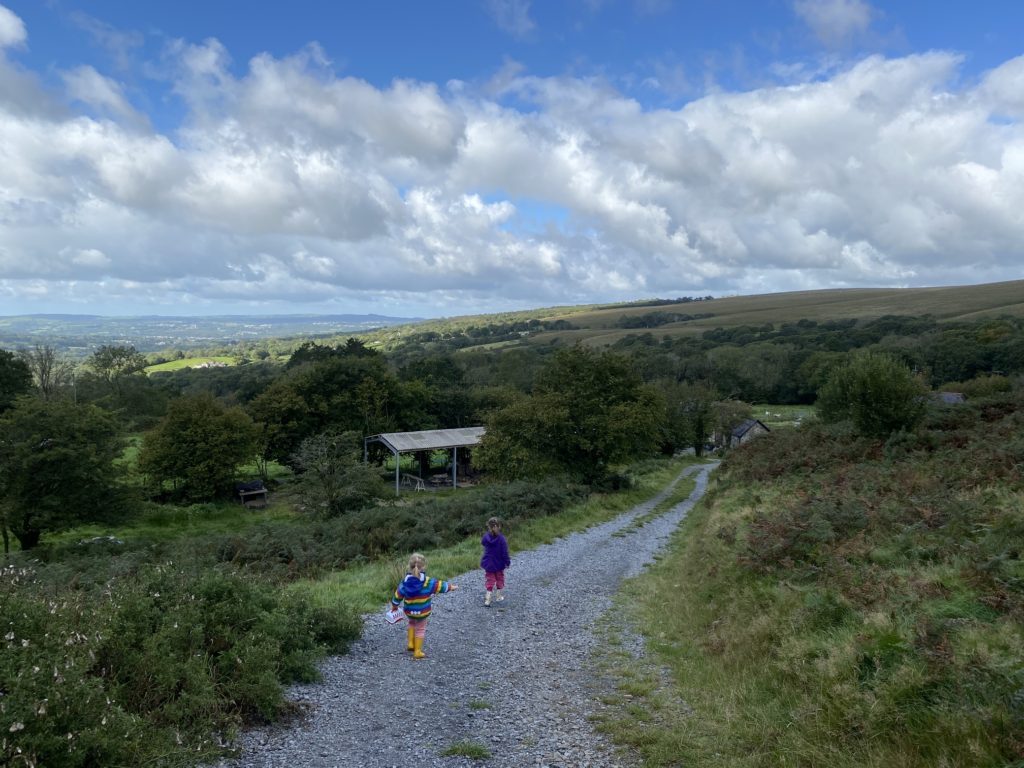 children walking down hill at Cwmberach FarmTRAVEL REVIEW - Glamping at Cwmberach Uchaf Farm with Feather Down