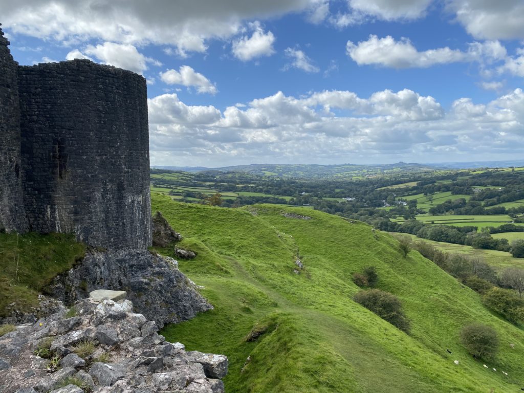 view of countryside and castleTRAVEL REVIEW - Glamping at Cwmberach Uchaf Farm with Feather Down