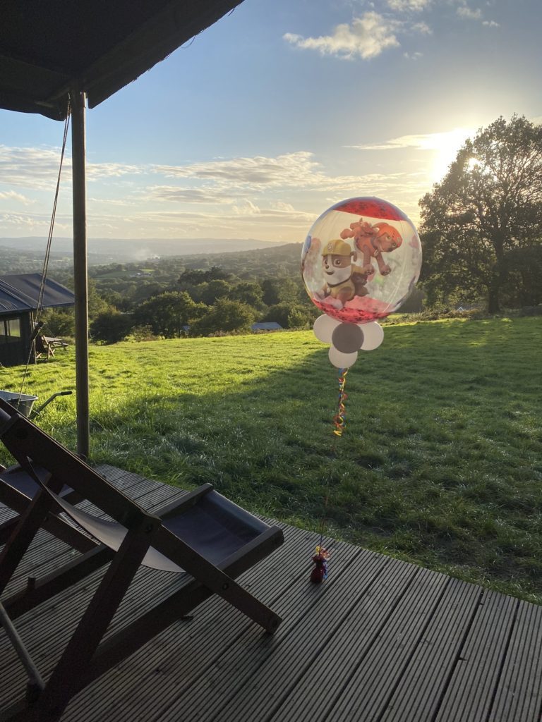 balloon in from of hill view at Cwmberach Uchaf Farm 