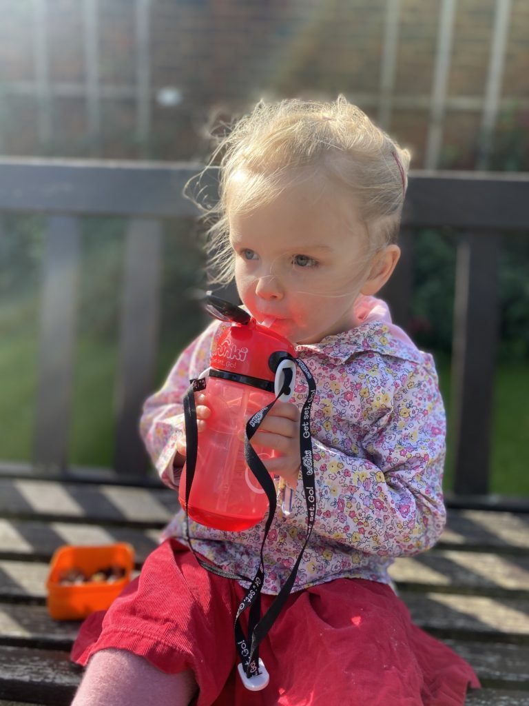 girl drinking from trunki drinks bottle 