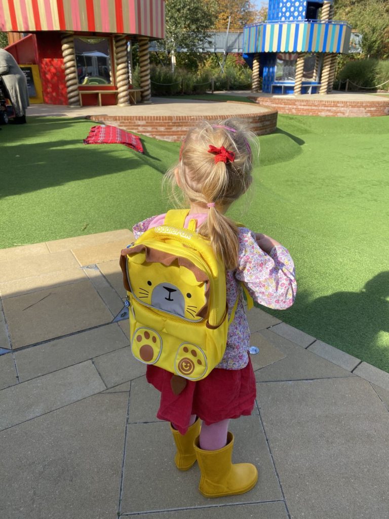 girl wearing trunki toddlepak backpack