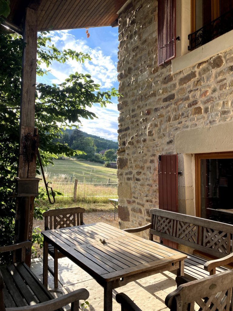 view outside chateau of table and chairs 