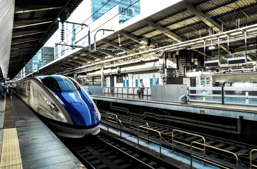 a highspeed train passing through a station , you can use clubcard points to buy rail cards