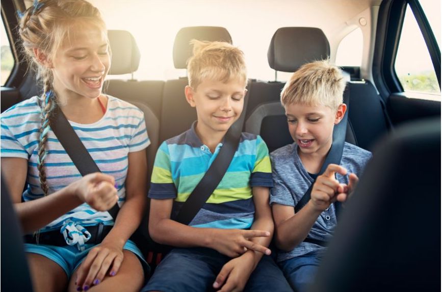 kids playing in car